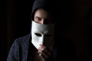 Man with hoody and mask